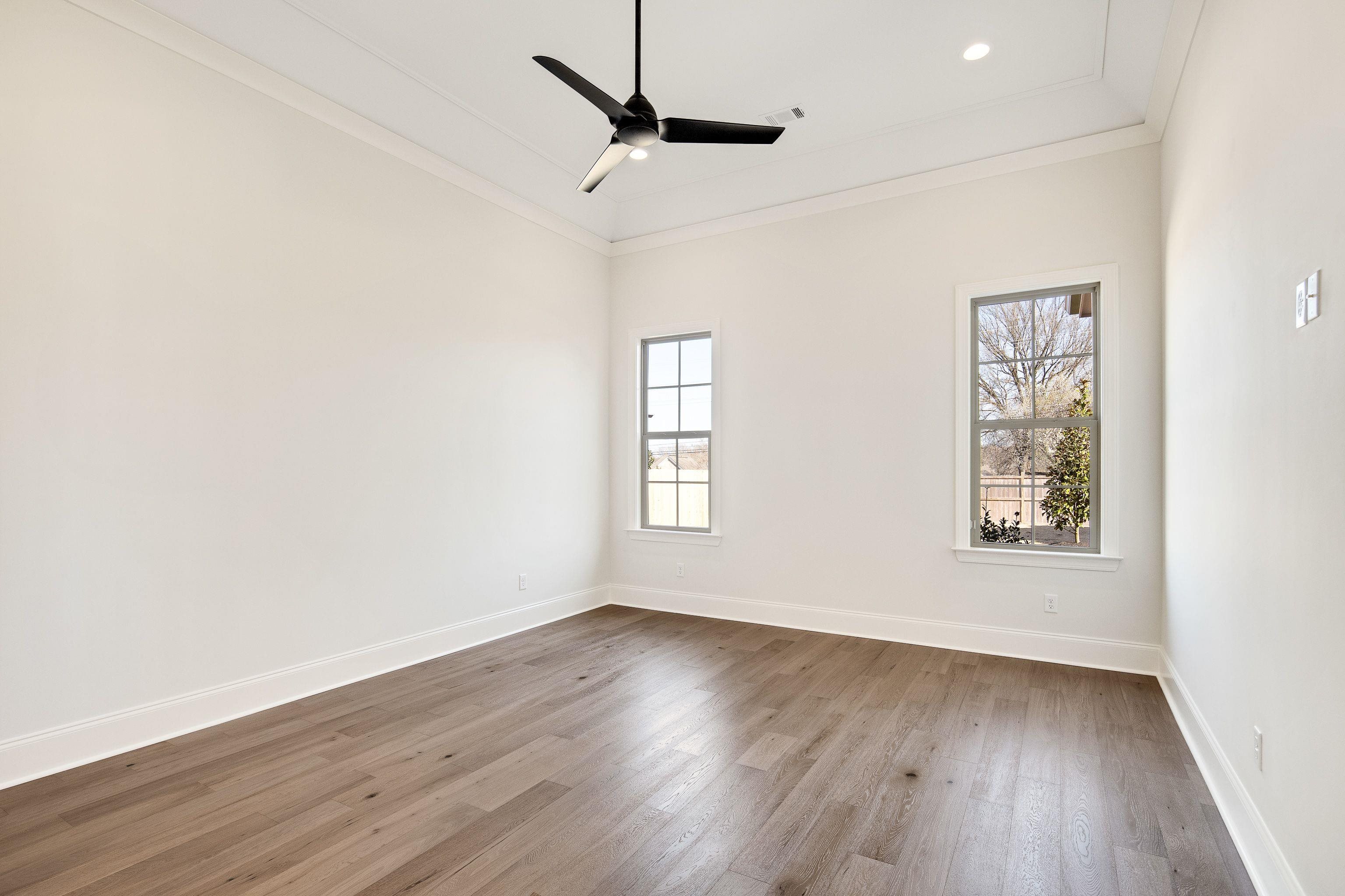 272 Keisie Lane Collierville, TN 38017 - Photo 14 of 30 wooden floor in an empty room with a window