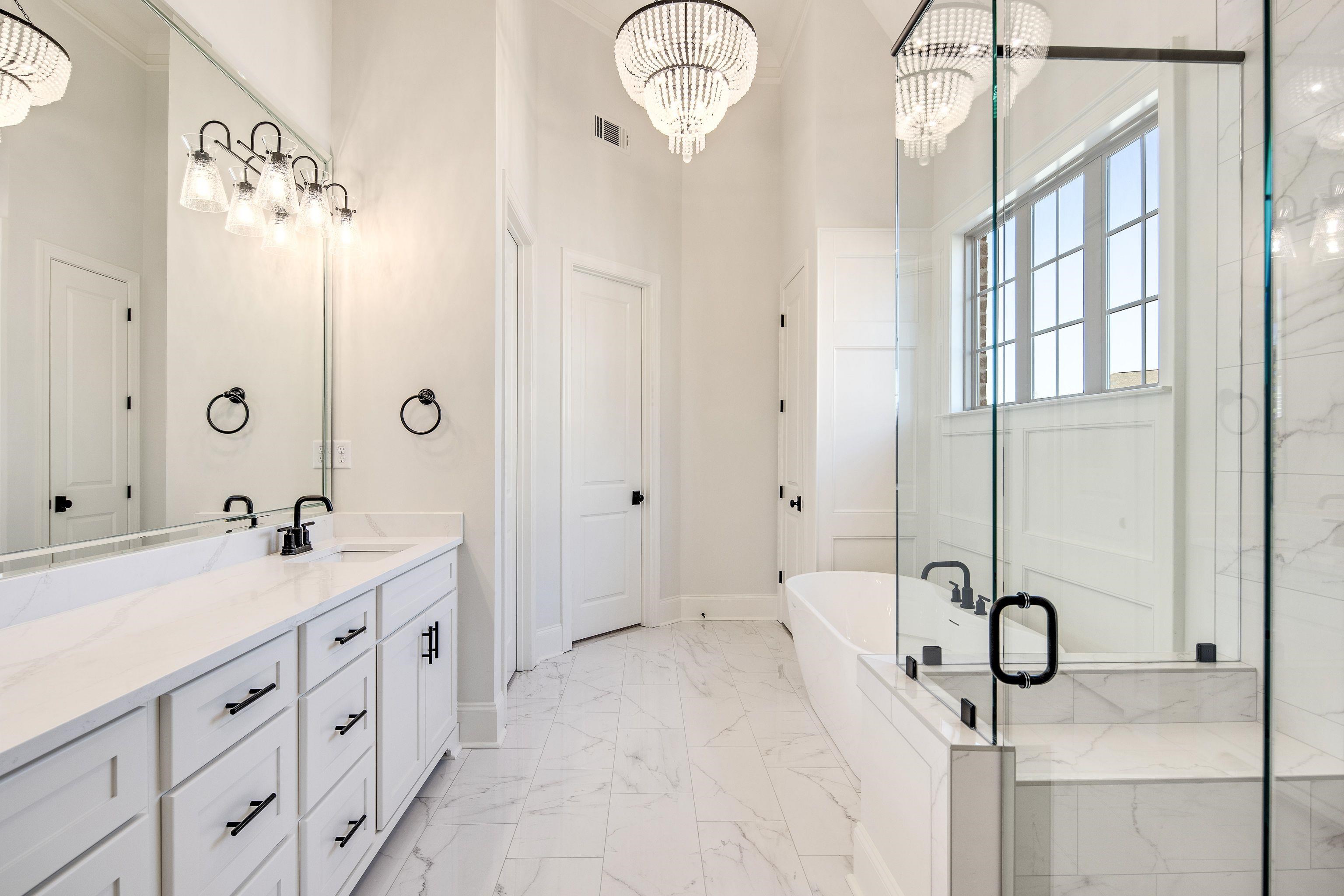 272 Keisie Lane Collierville, TN 38017 - Photo 15 of 30 a bathroom with a double vanity sink mirror and shower
