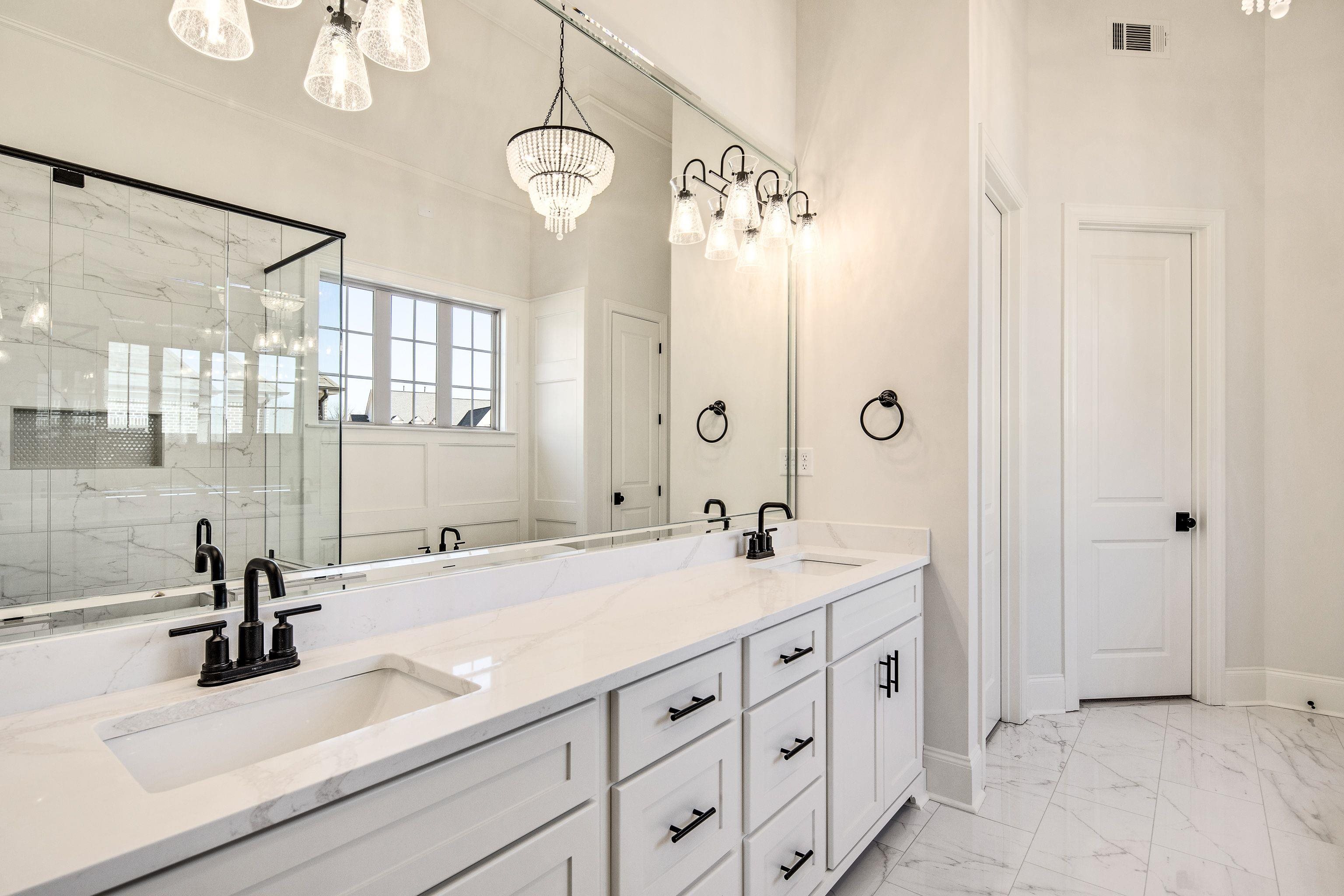 272 Keisie Lane Collierville, TN 38017 - Photo 17 of 30 a bathroom with a sink double vanity and a mirror