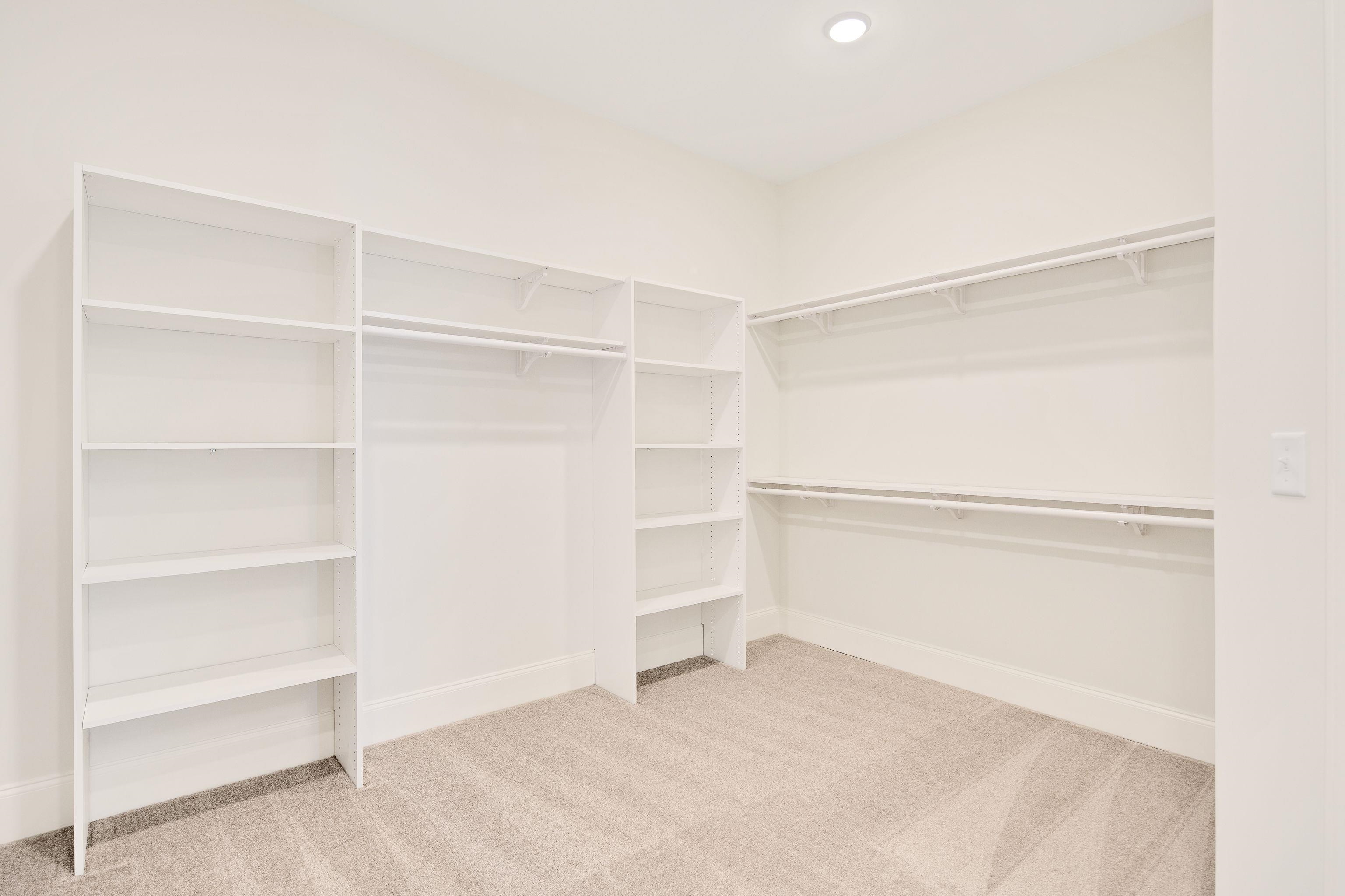 272 Keisie Lane Collierville, TN 38017 - Photo 18 of 30 a view of an empty walk in closet