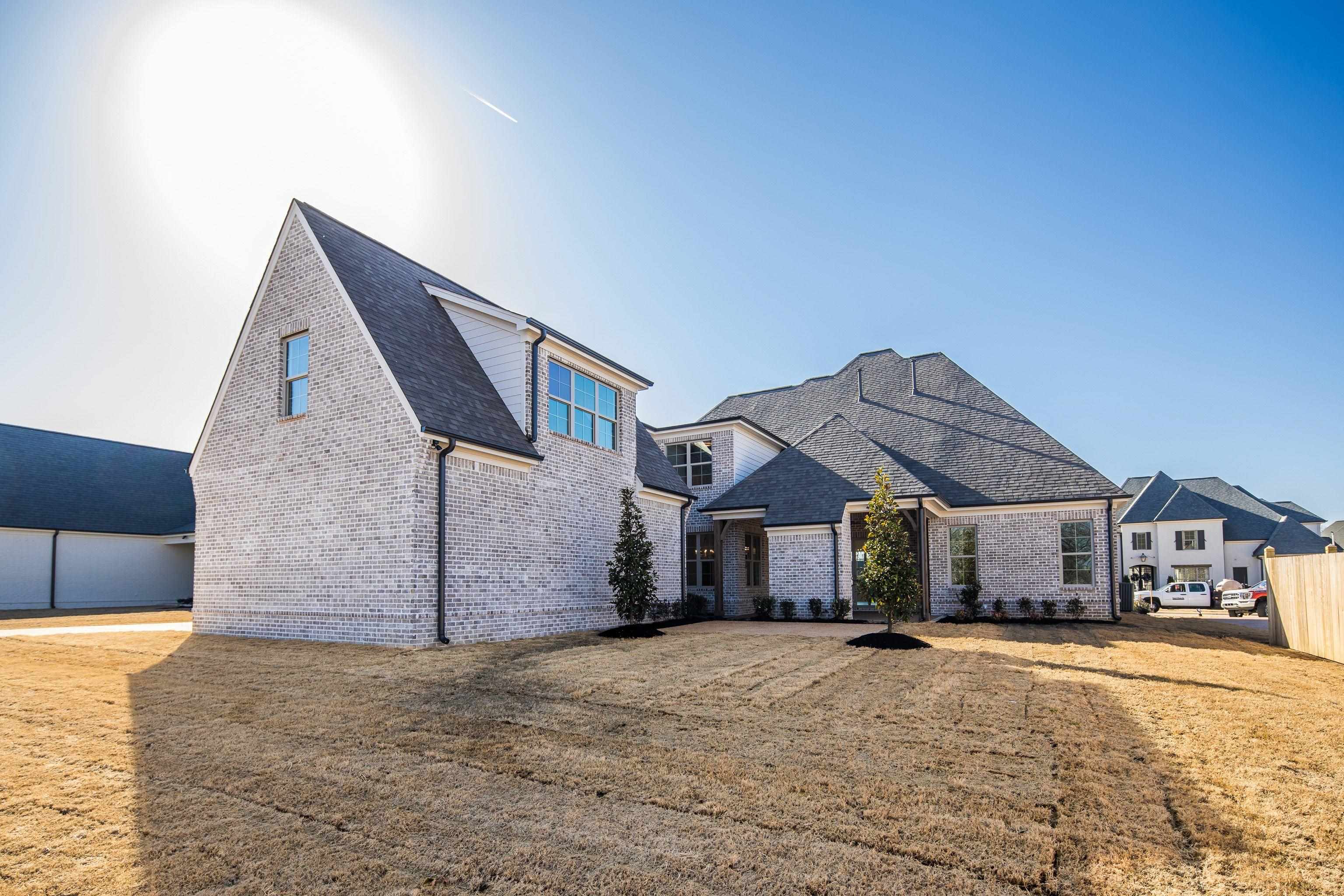 272 Keisie Lane Collierville, TN 38017 - Photo 24 of 30 a front view of a house with a yard and garage