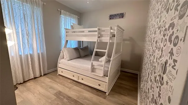 a living room with a furniture and a window