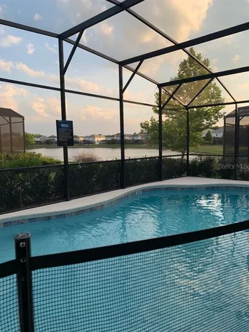 a view of a street with a car parked on road