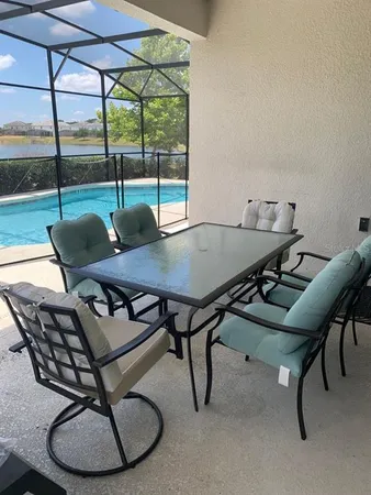 a living room with furniture and a table