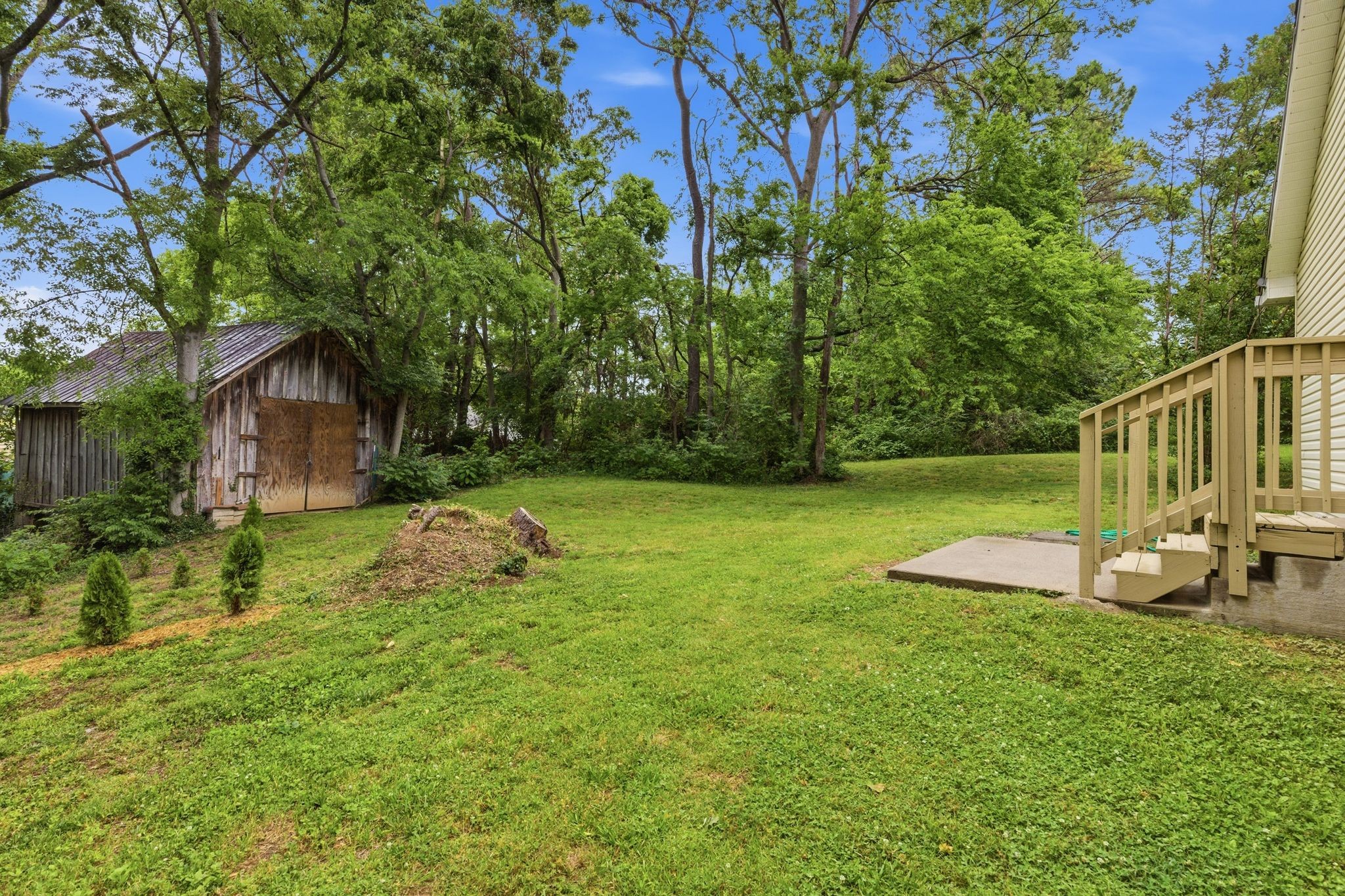 2642 Hibbitts Road Nashville, TN 37214 - Photo 29 of 29 a front view of a house with garden and trees