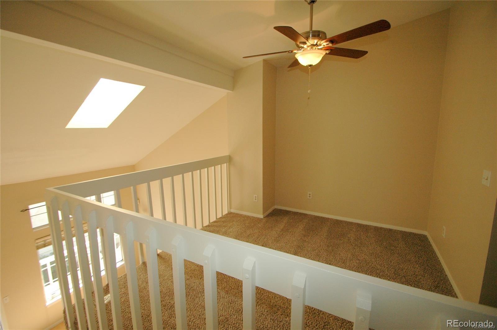 165 South Sable Boulevard, Unit R23 Aurora, CO 80012 - Photo 8 of 11 a view of entryway with stairs