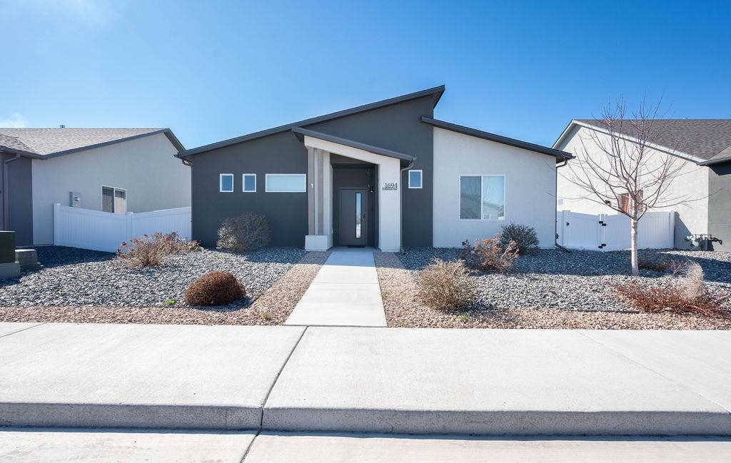 1694 Tungsten Way Fruita, CO 81521 - Photo 1 of 22 a house view with a outdoor space