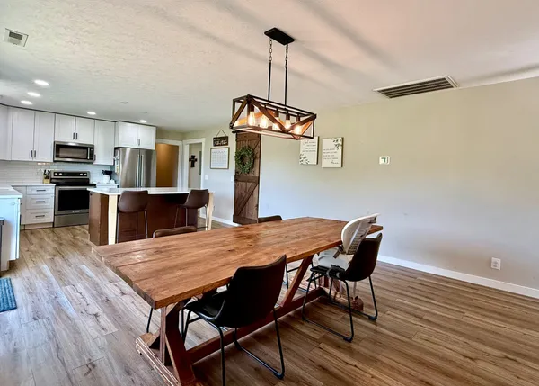 a kitchen with a two sink and a window