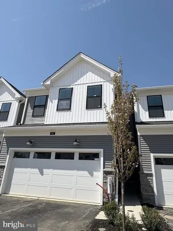 a view of a house with a garage