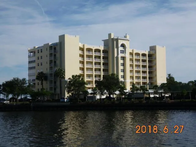 a view of ocean with building and lake view