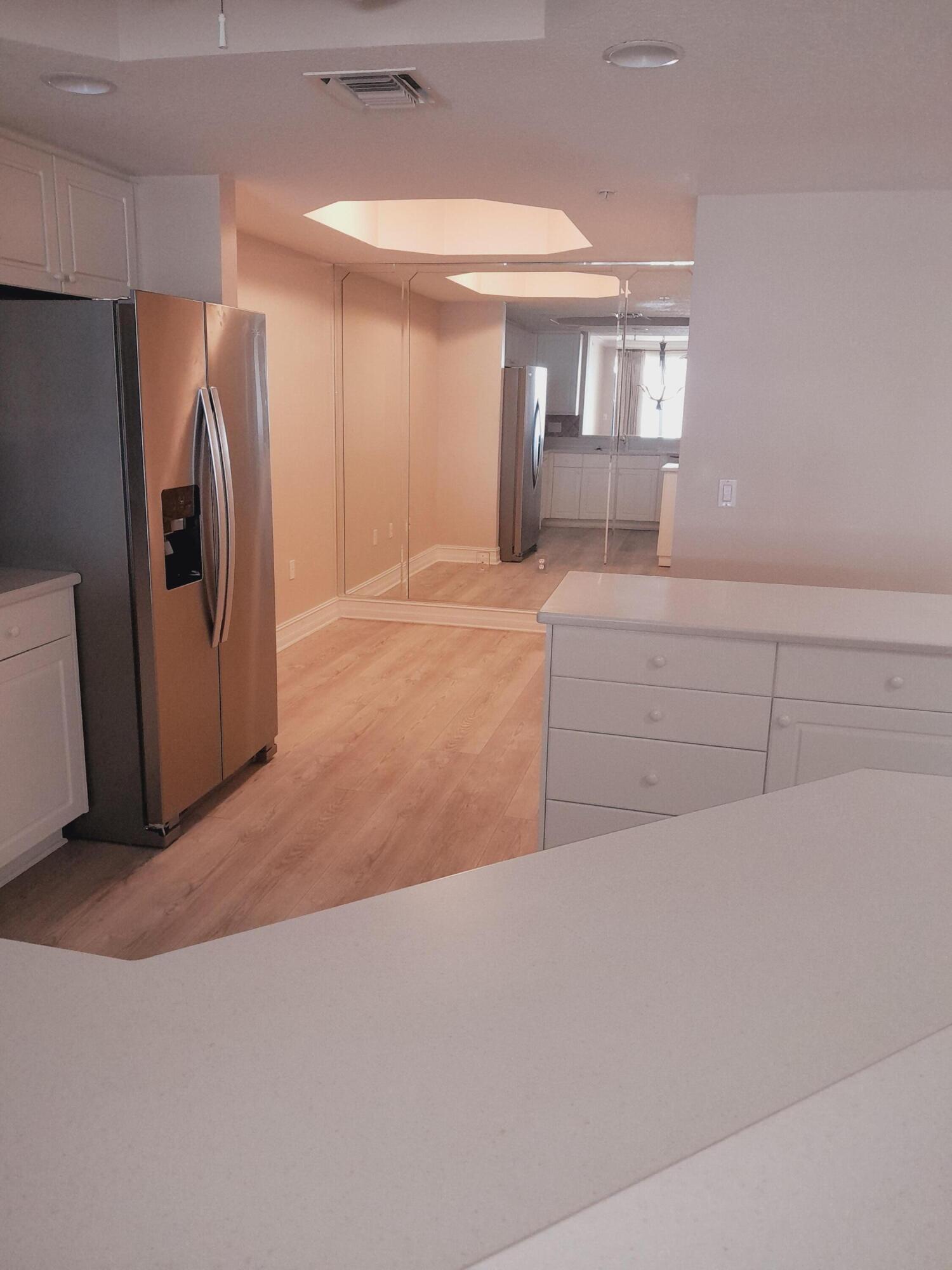 480 Sail Lane, Unit 302 Merritt Island, FL 32953 - Photo 6 of 21 a view of livingroom with furniture and refrigerator