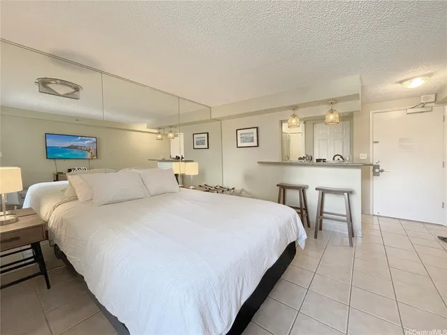 a bed room with a bed and a table