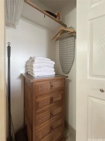 a bathroom with a shower curtain and a sink