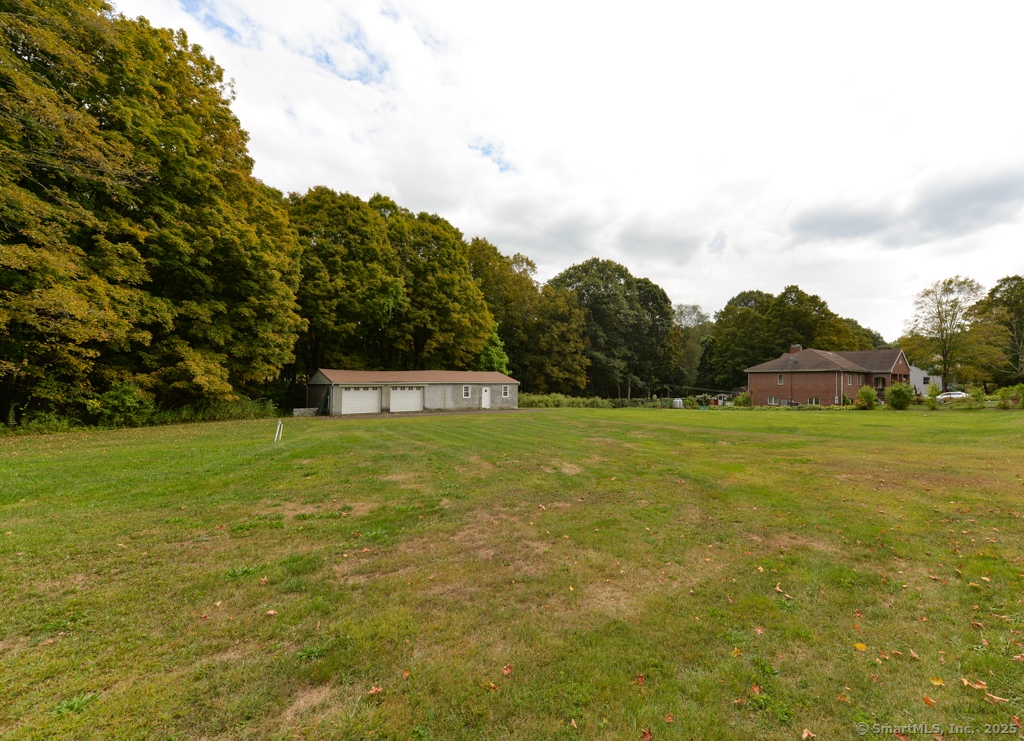 701 Main Street Hamden, CT 06514 - Photo 2 of 6 a view of a field with large trees