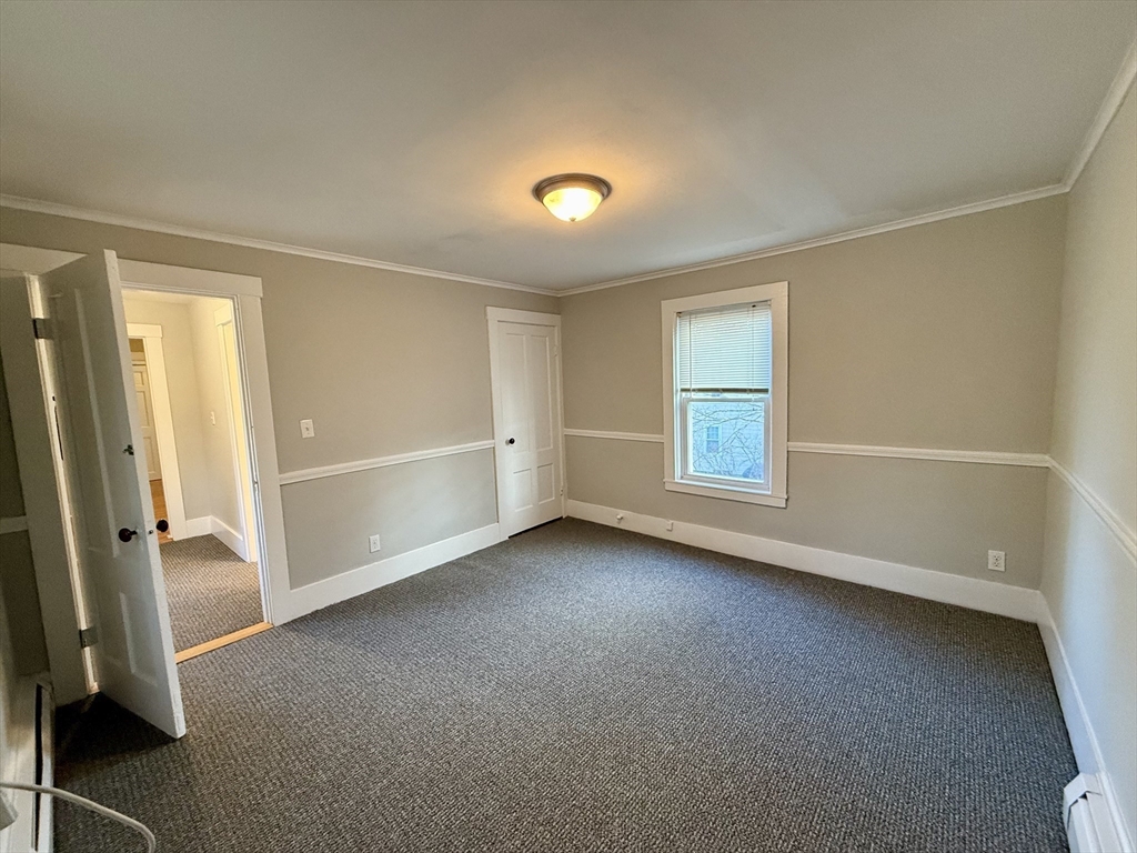 19 Ruggles Street, Unit 2 Westborough, MA 01581 - Photo 11 of 14 a view of an empty room with a window