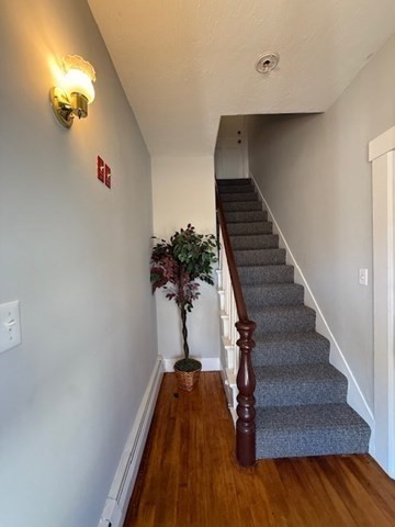 19 Ruggles Street, Unit 2 Westborough, MA 01581 - Photo 2 of 14 a view of entryway and hall with wooden floor