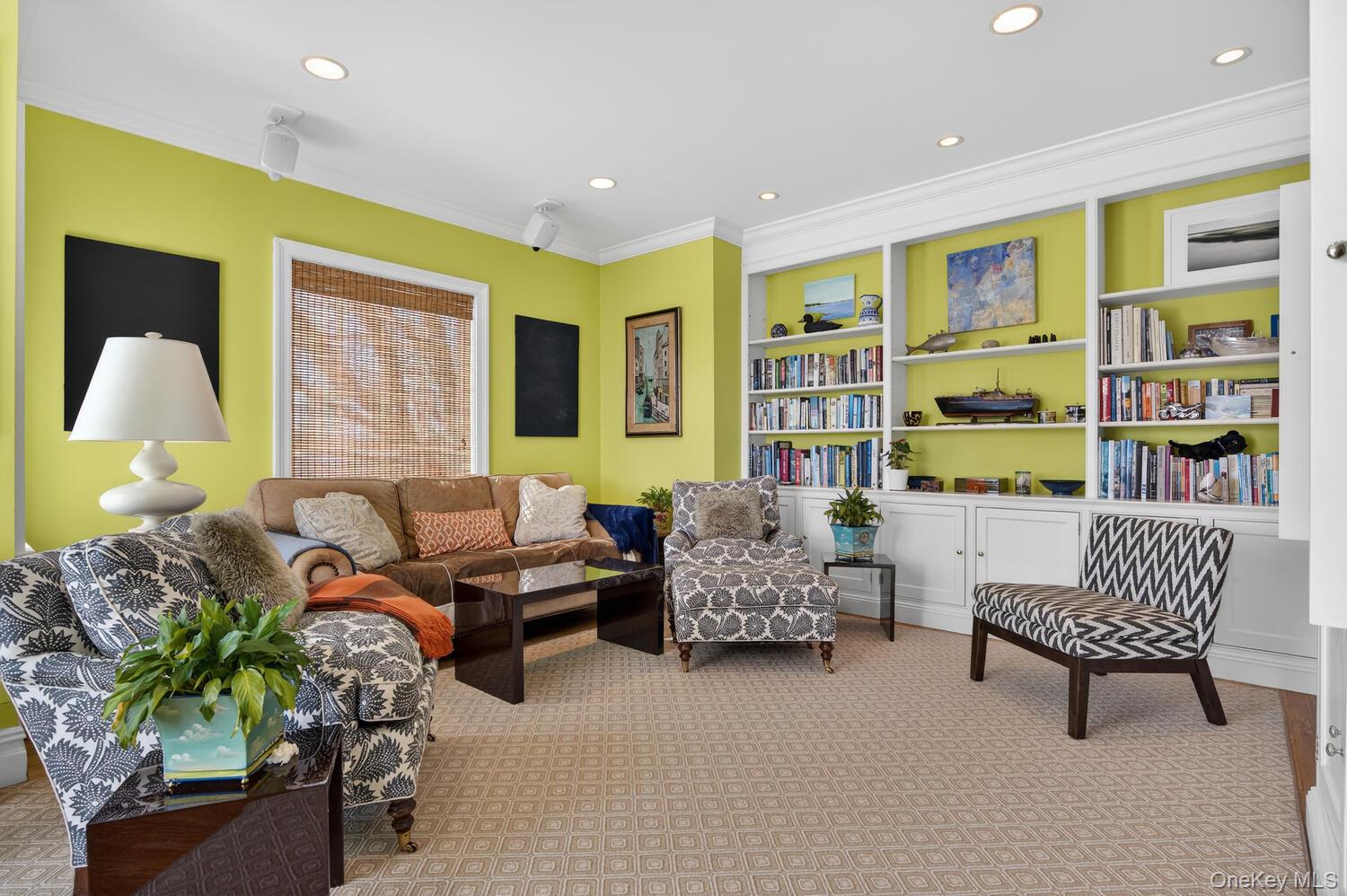 336 Centre Island Road Oyster Bay, NY 11771 - Photo 11 of 38 a living room with furniture and a potted plant