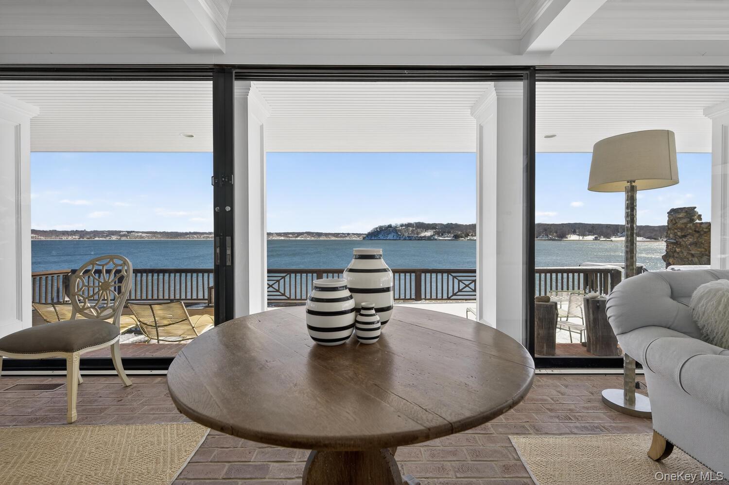 336 Centre Island Road Oyster Bay, NY 11771 - Photo 12 of 38 a living room with furniture and a large window