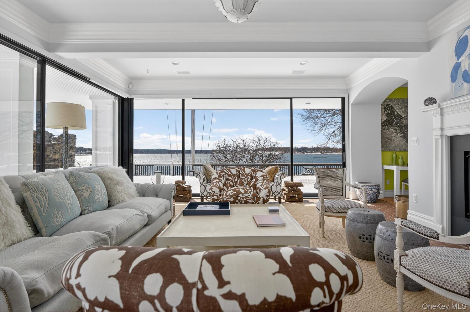 336 Centre Island Road Oyster Bay, NY 11771 - Photo 13 of 38 a living room with furniture and a large window