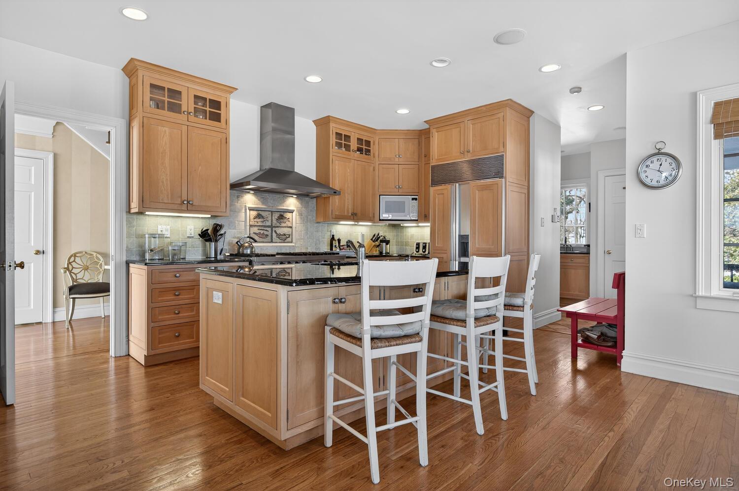336 Centre Island Road Oyster Bay, NY 11771 - Photo 16 of 38 a kitchen with stainless steel appliances granite countertop a stove and white cabinets
