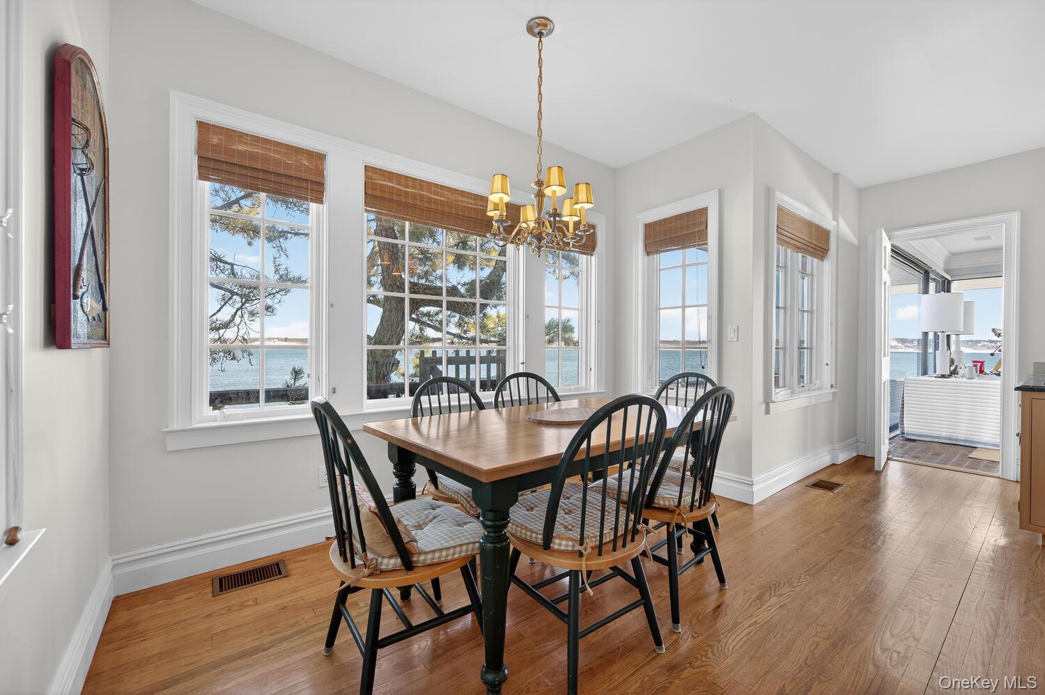 336 Centre Island Road Oyster Bay, NY 11771 - Photo 17 of 38 a dining room with furniture window wooden floor