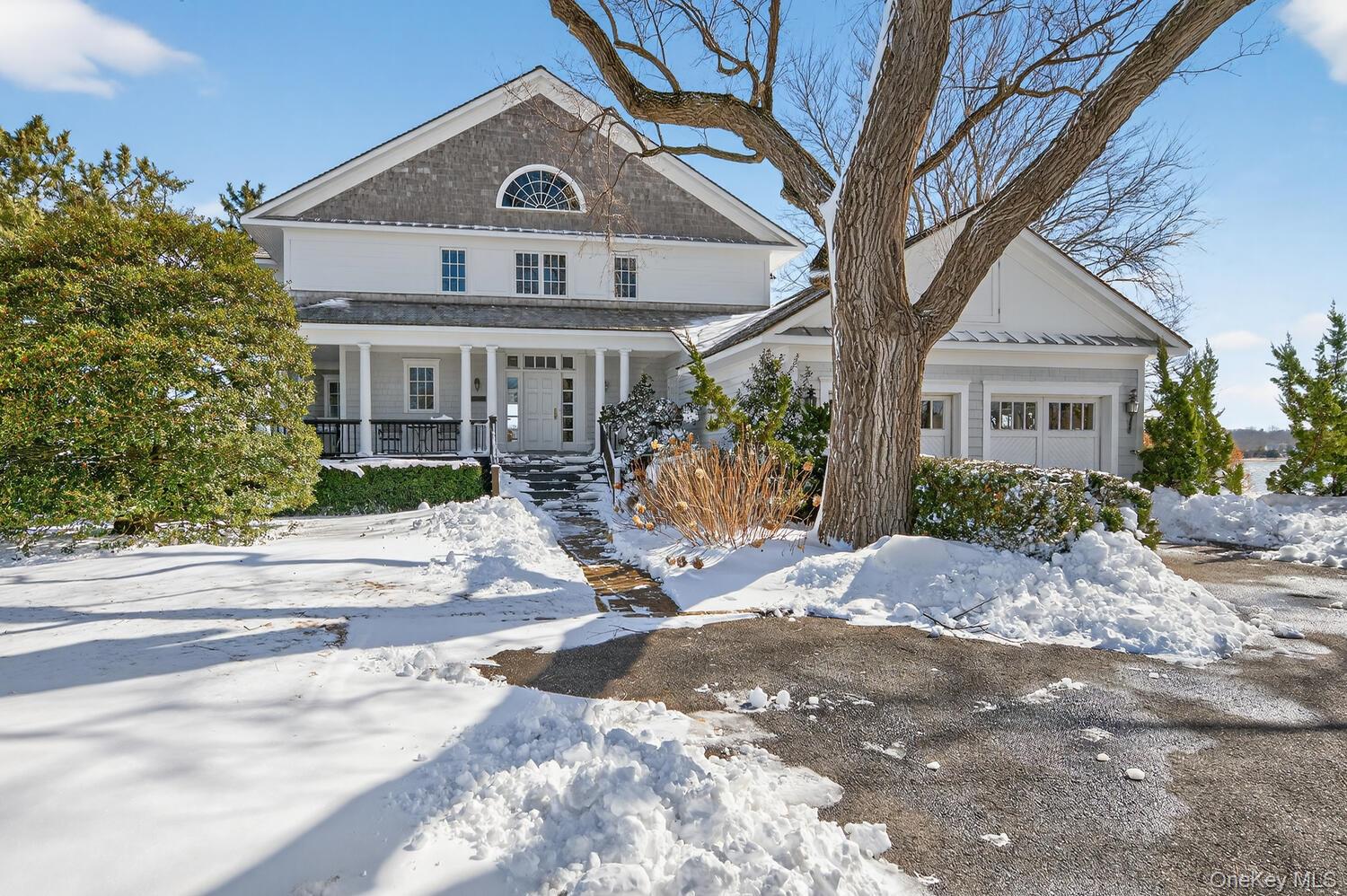 336 Centre Island Road Oyster Bay, NY 11771 - Photo 2 of 38 a front view of a house with garden and porch