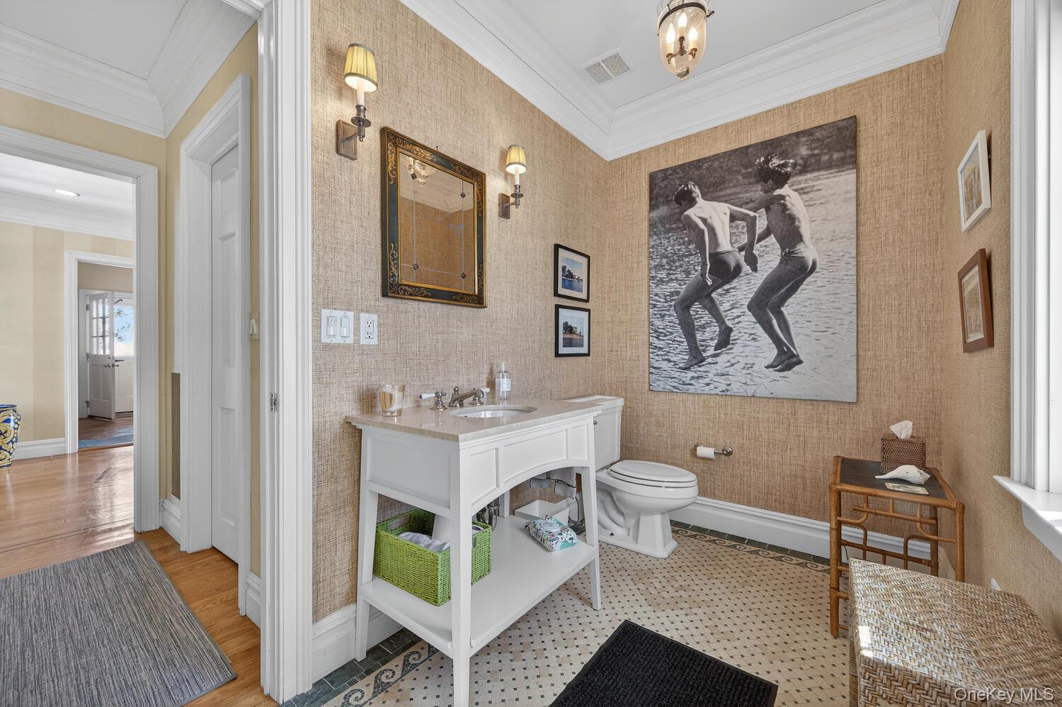 336 Centre Island Road Oyster Bay, NY 11771 - Photo 21 of 38 a spacious bathroom with a toilet a sink and a mirror