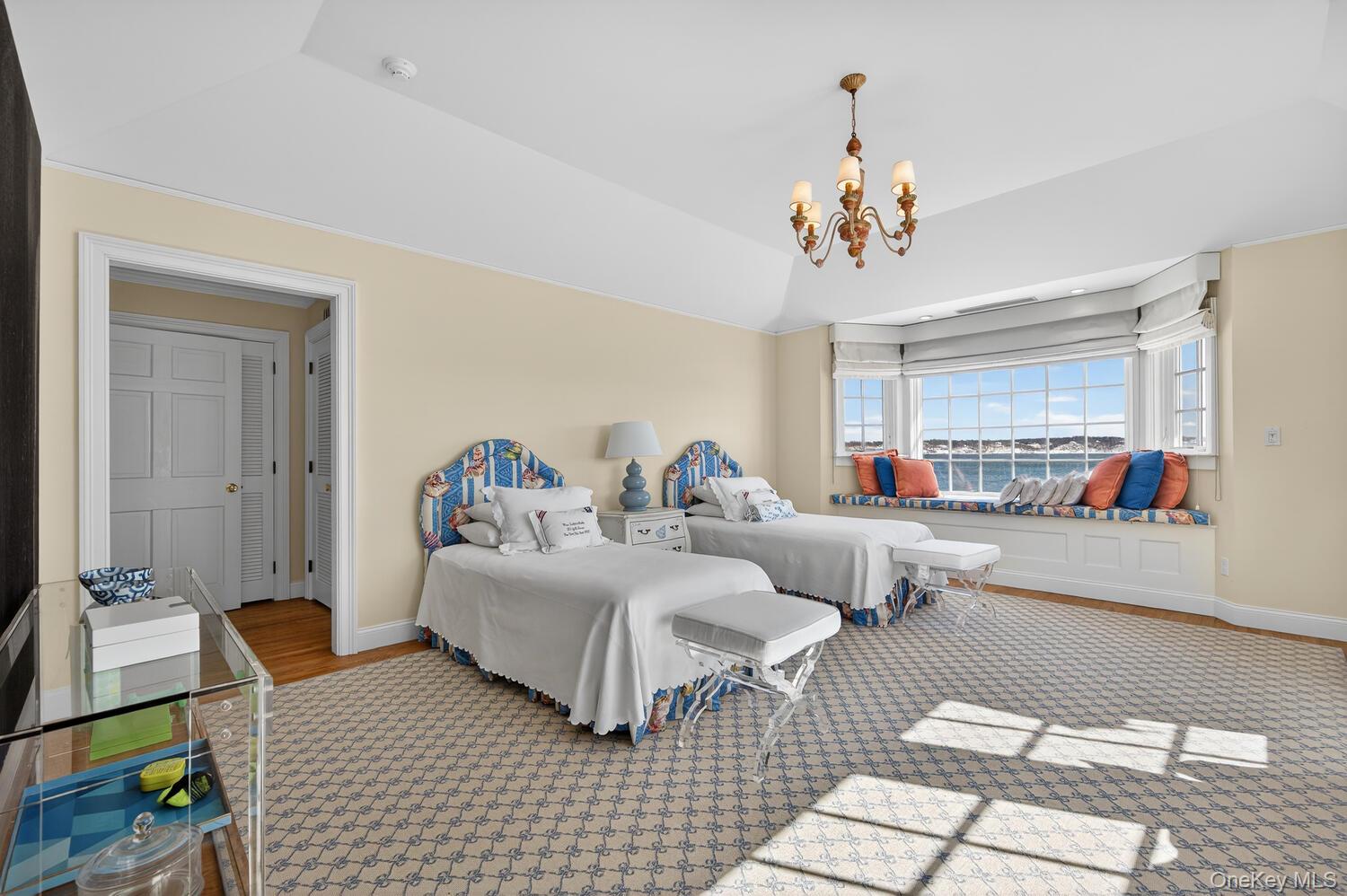 336 Centre Island Road Oyster Bay, NY 11771 - Photo 30 of 38 a living room with furniture and a chandelier