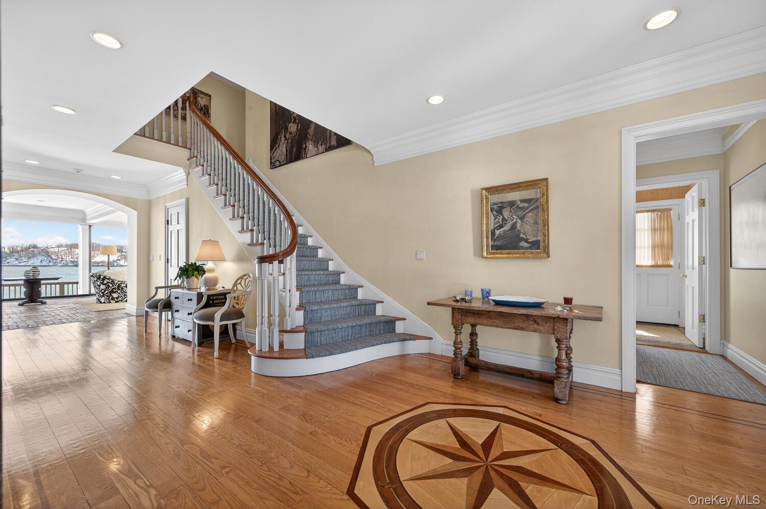 336 Centre Island Road Oyster Bay, NY 11771 - Photo 4 of 38 a view of entryway livingroom and hall with wooden floor