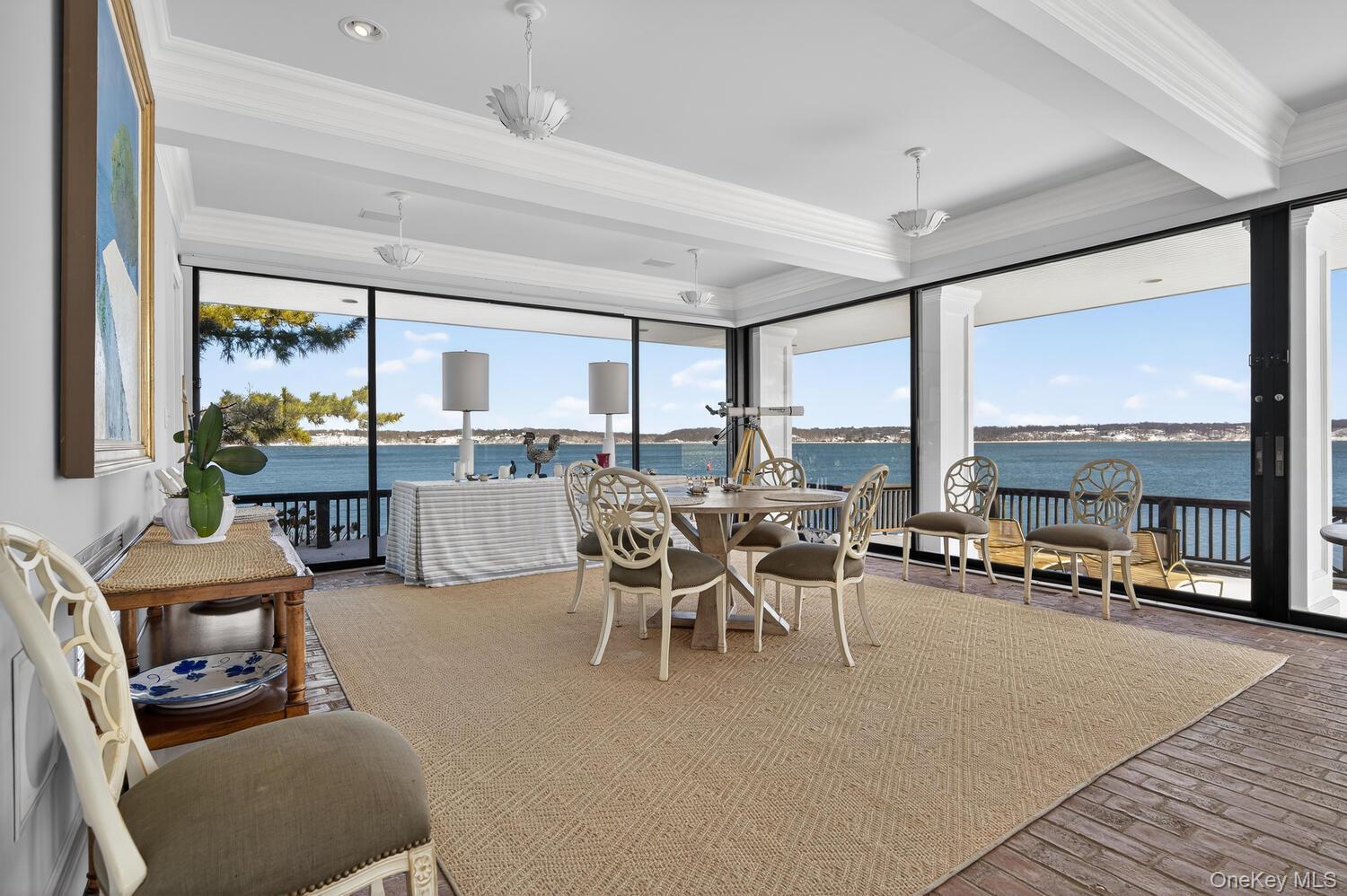 336 Centre Island Road Oyster Bay, NY 11771 - Photo 7 of 38 a view of a dining room with furniture window and outside view