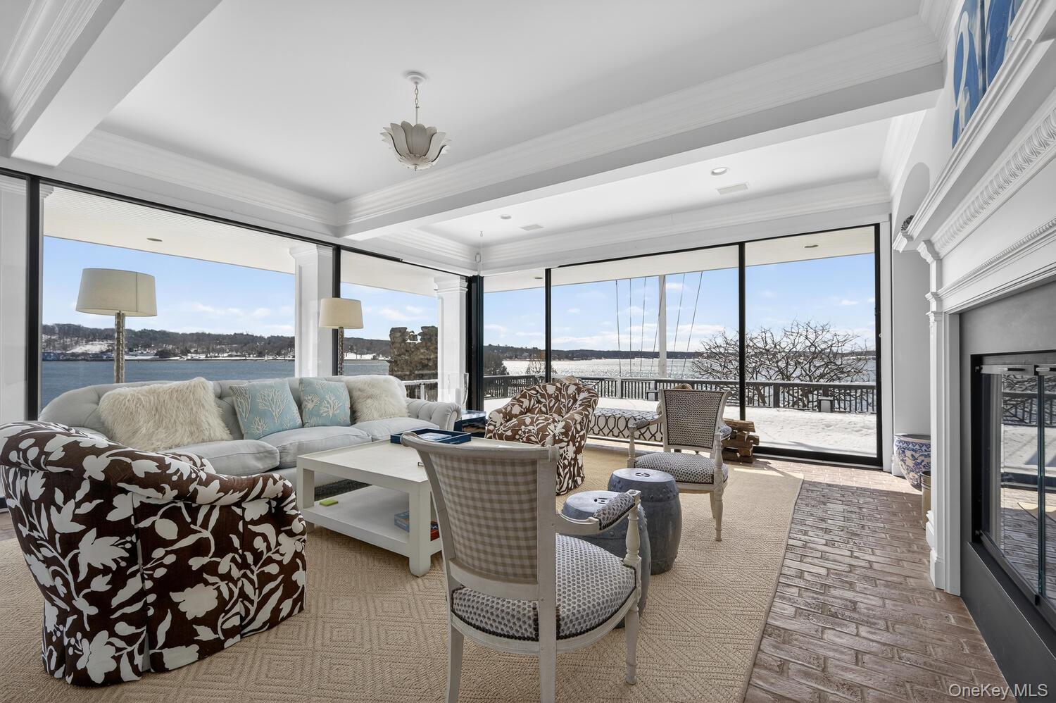 336 Centre Island Road Oyster Bay, NY 11771 - Photo 9 of 38 a living room with furniture and a large window