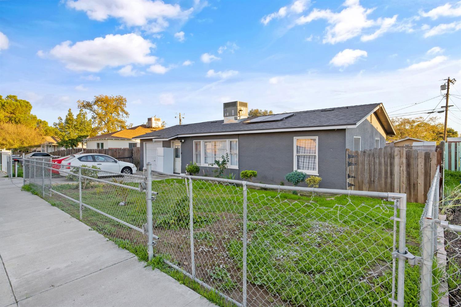 821 Lincoln Street Hanford, CA 93230 - Photo 2 of 22 a view of a house with backyard and sitting area