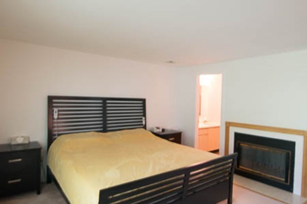 84 Jasper Lane, Unit 84 Randolph, MA 02368 - Photo 5 of 11 a close up of a bed in a room