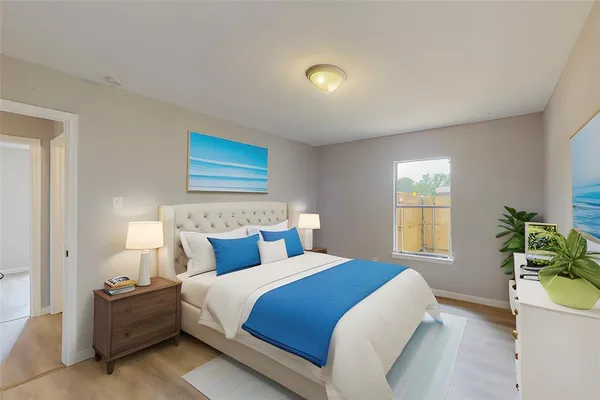 a bedroom with a bed and a couch