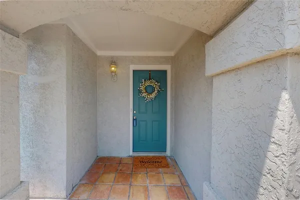 a view of a hallway view with wooden floor