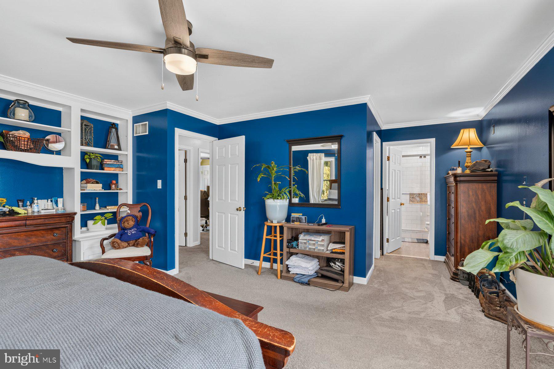 49 Rockland Road Westminster, MD 21158 - Photo 51 of 66 a bedroom with furniture and a chandelier