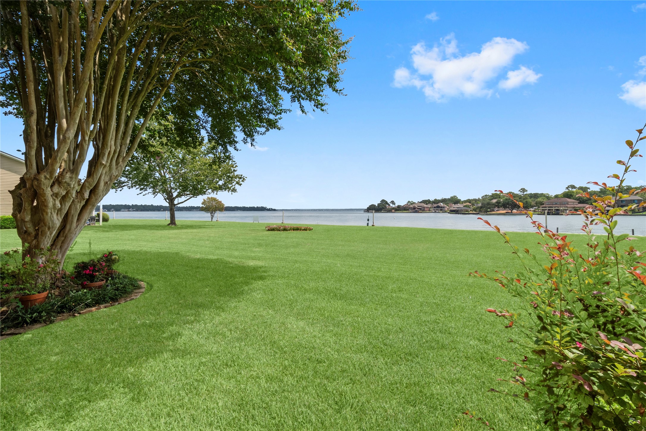 135 April Point Drive South Conroe, TX 77356 - Photo 25 of 46 a view of yard with swimming pool and green space
