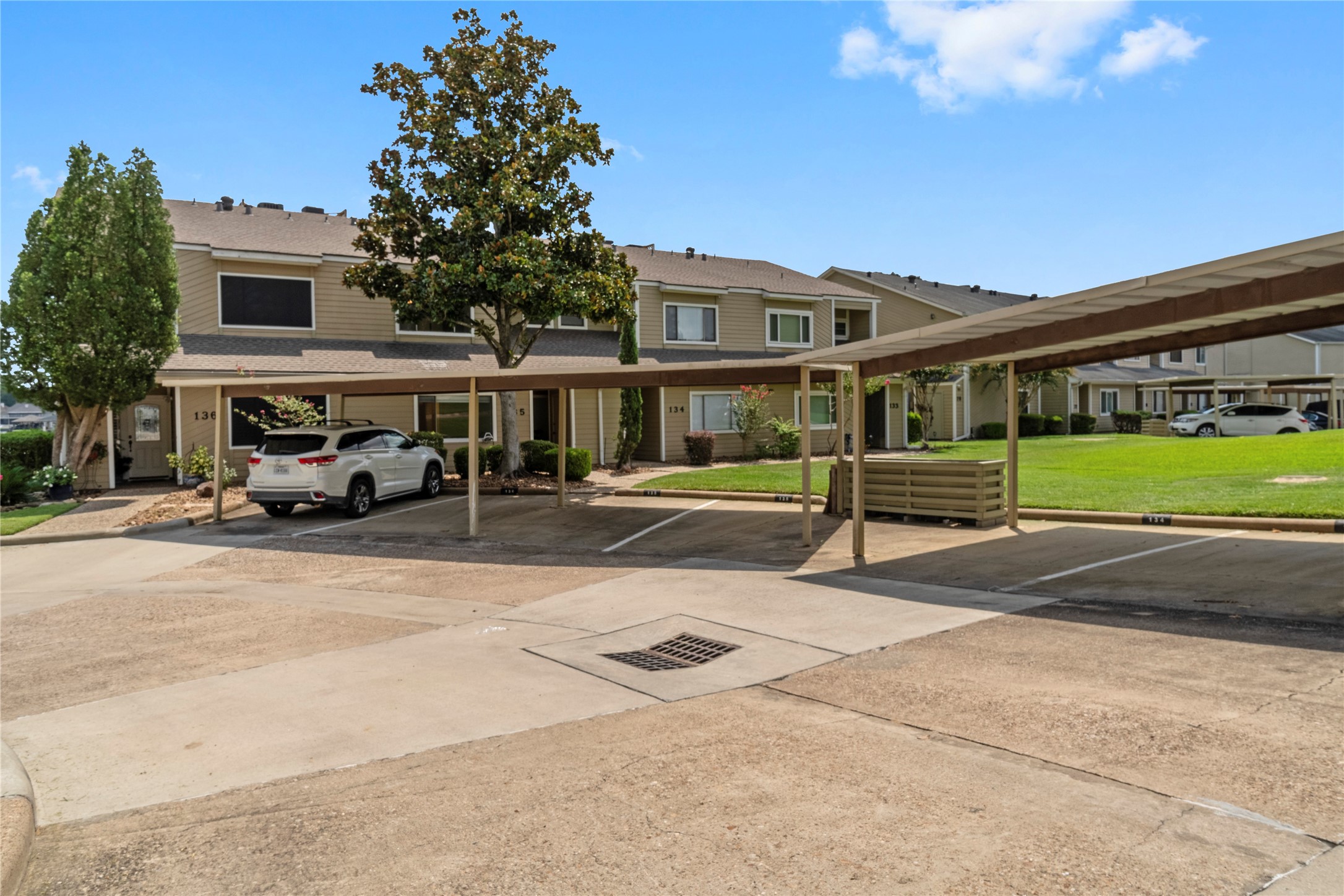 135 April Point Drive South Conroe, TX 77356 - Photo 46 of 46 a car parked in front of a building