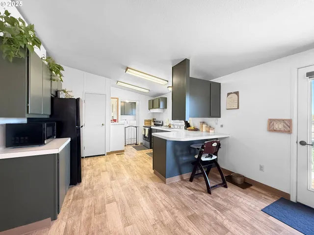 a view of a kitchen from the dining room