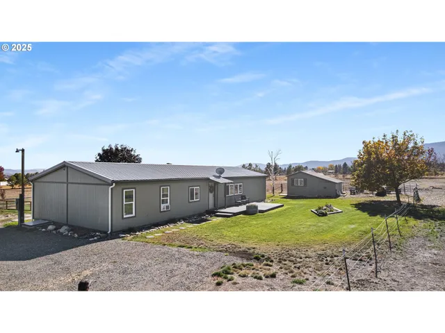 a black and white photo of a house
