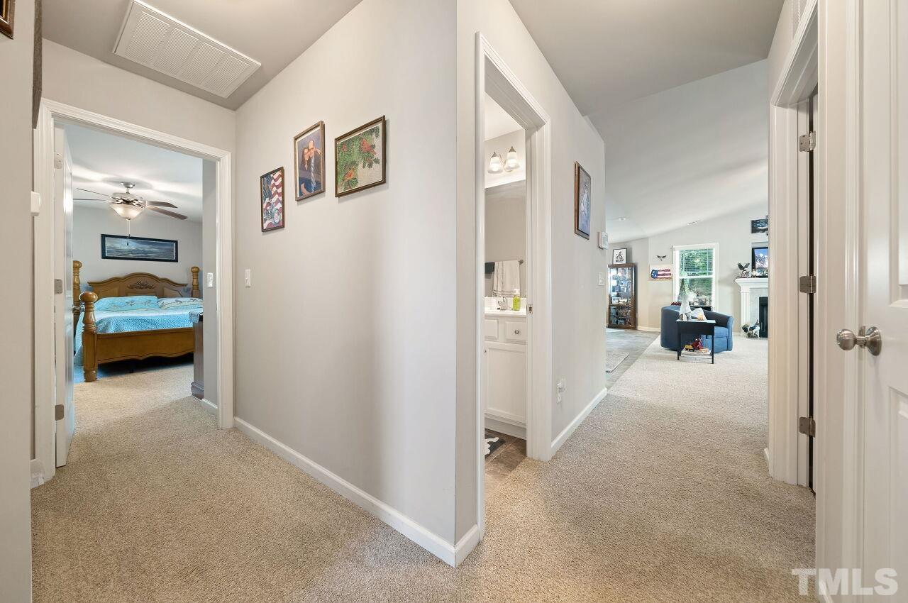 169 Willow Ridge Circle Willow Spring, NC 27592 - Photo 15 of 30 a view of hallway with livingroom and bedroom