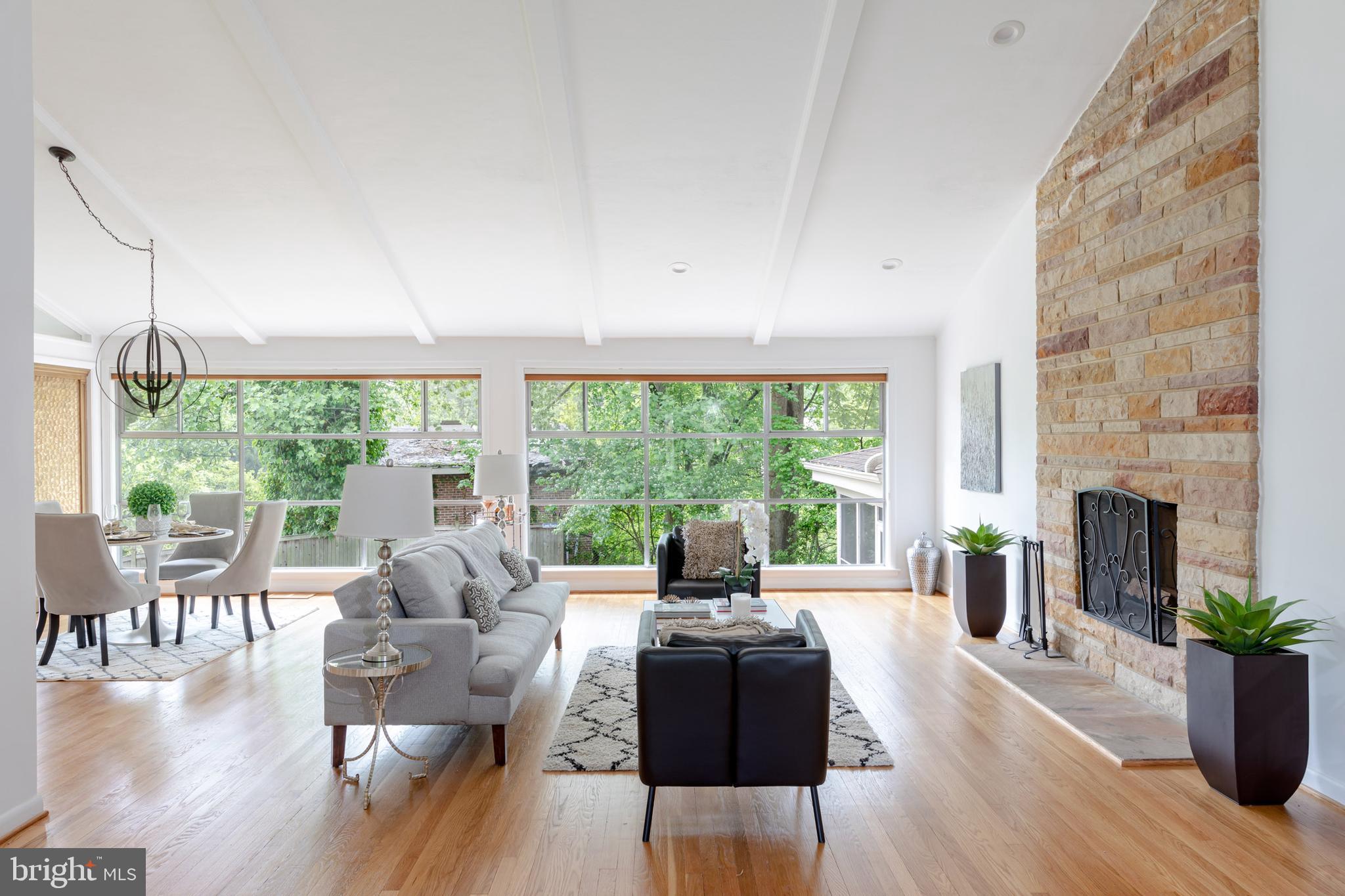 8221 West Beach Terrace Northwest Washington, DC 20012 - Photo 2 of 23 Walls of windows bring the outdoors inside