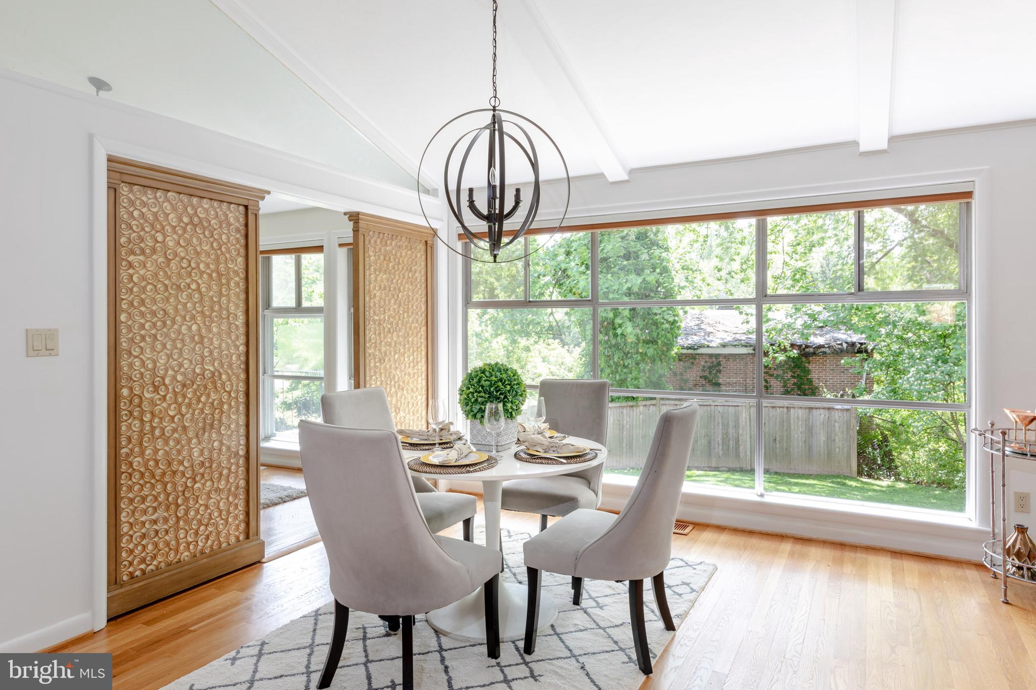 8221 West Beach Terrace Northwest Washington, DC 20012 - Photo 5 of 23 Dining area overlooking the large rear yard