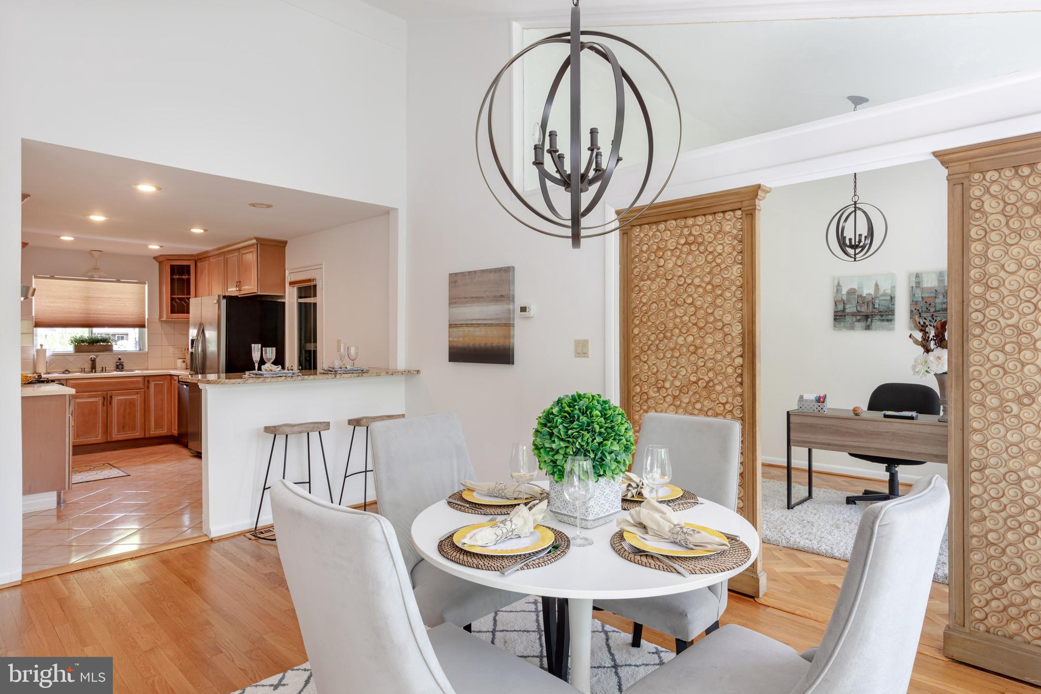 8221 West Beach Terrace Northwest Washington, DC 20012 - Photo 6 of 23 Updated kitchen offers breakfast bar.