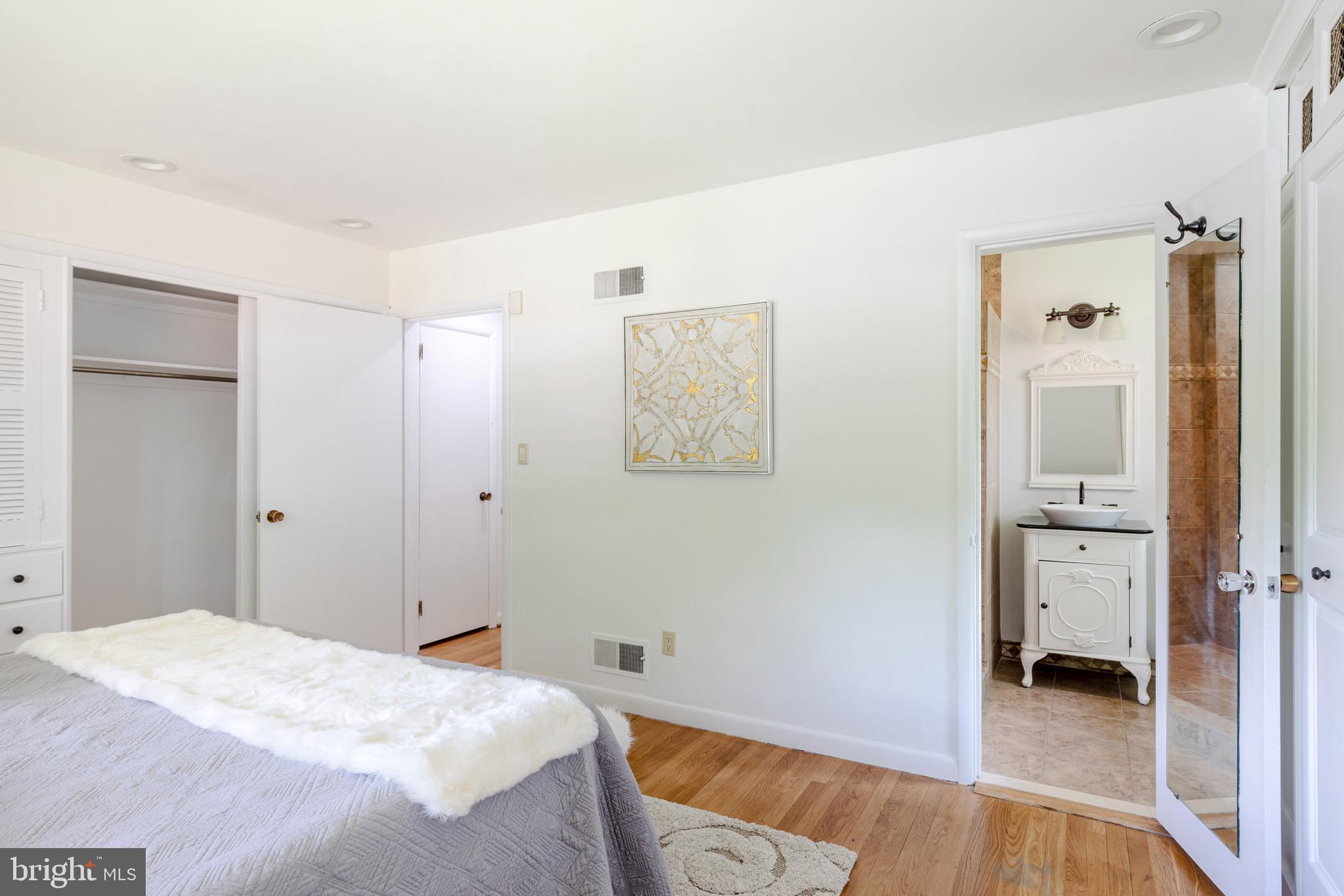 8221 West Beach Terrace Northwest Washington, DC 20012 - Photo 9 of 23 Primary bedroom suite with double vanity