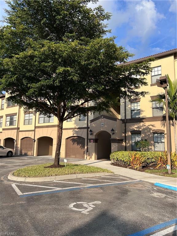 a view of a building with a street