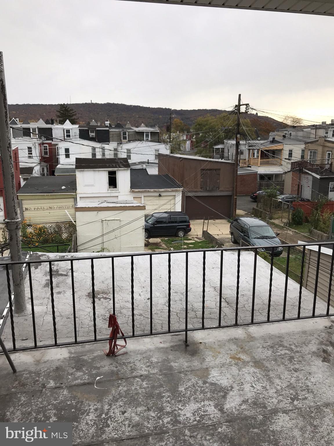 815 Weiser Street Reading, PA 19601 - Photo 19 of 19 a view of a terrace with a bench and chairs