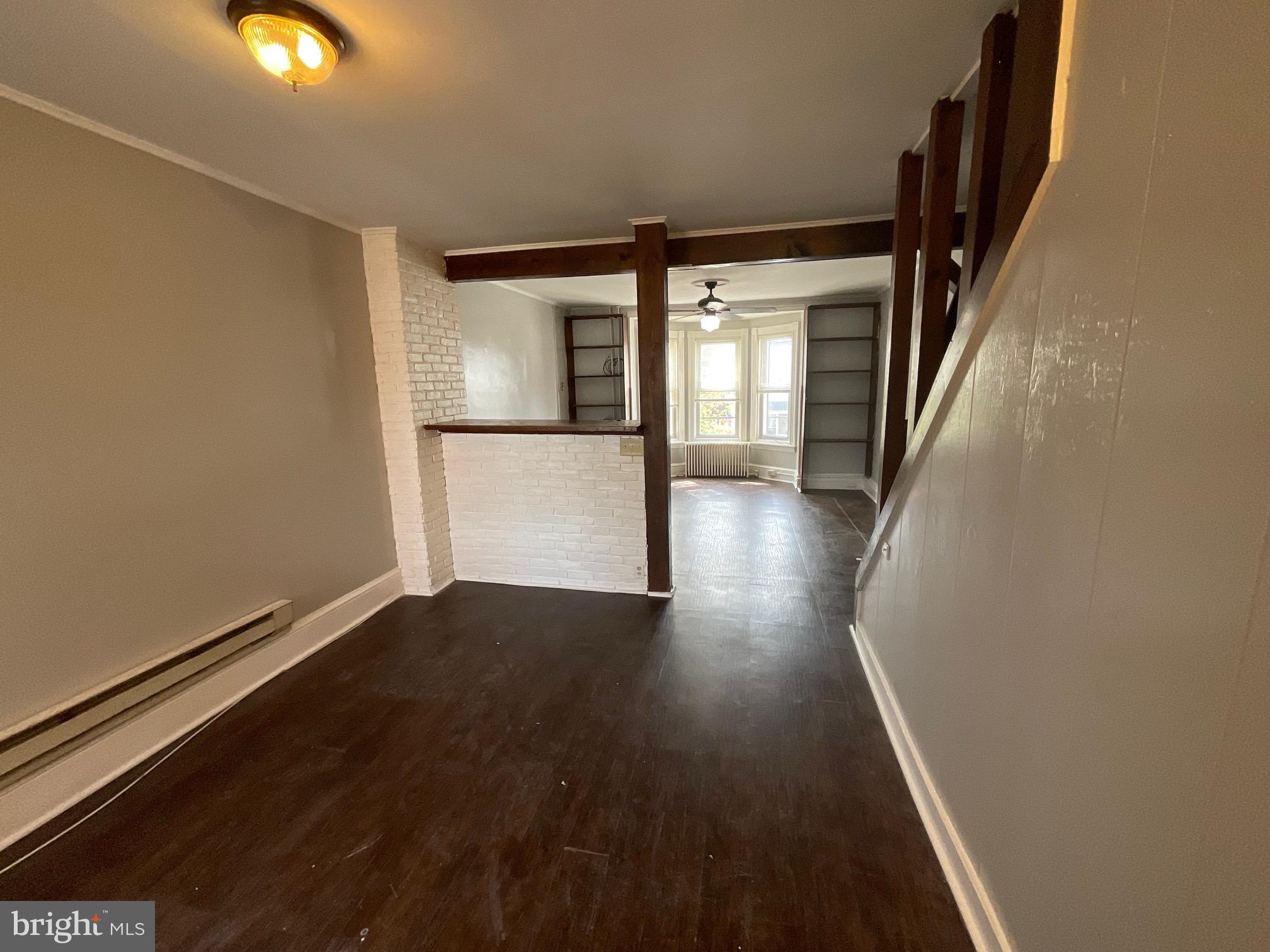 815 Weiser Street Reading, PA 19601 - Photo 10 of 19 a view of entryway with wooden floor