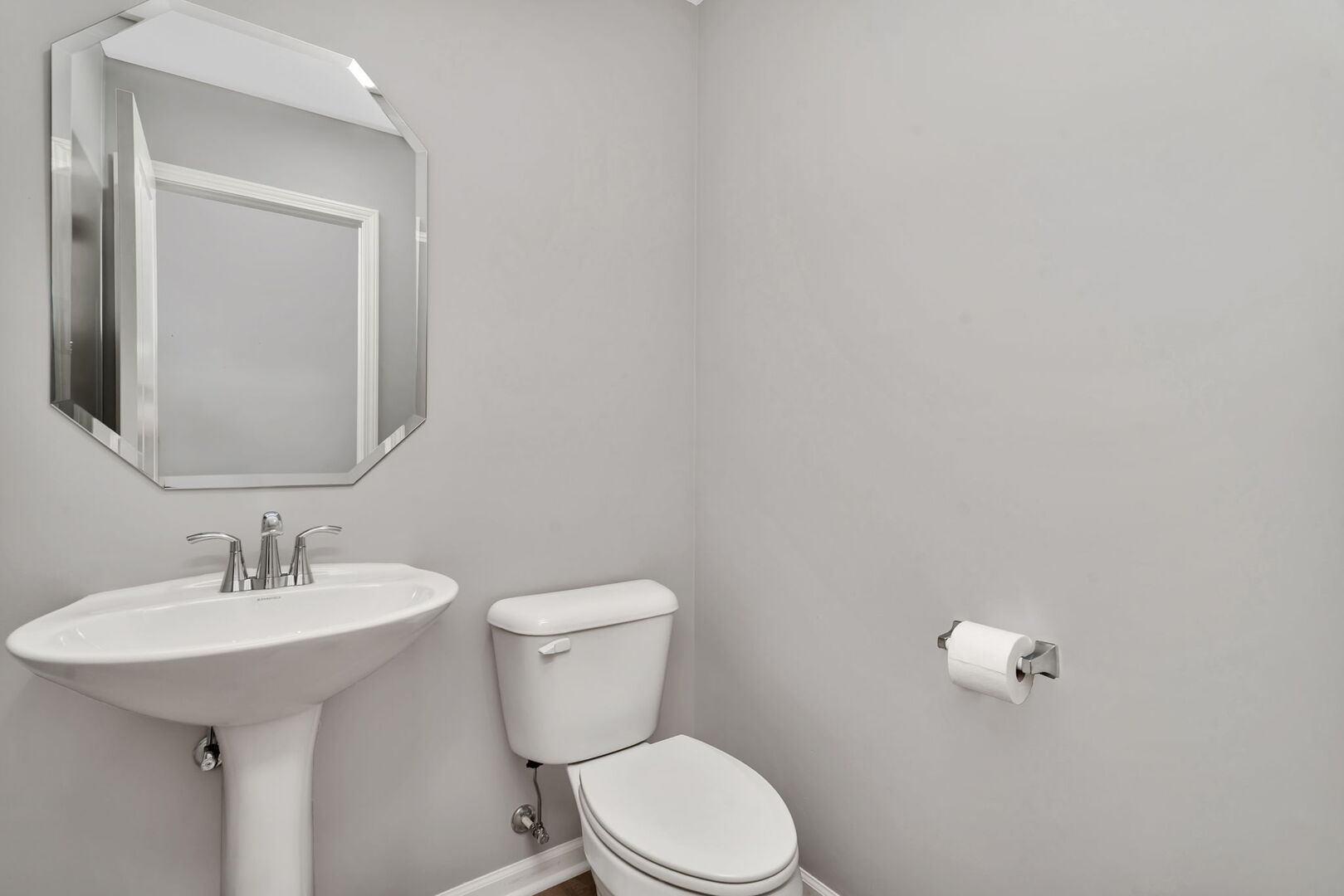 1334 Hawk Hollow Drive Yorkville, IL 60560 - Photo 13 of 28 a bathroom with a toilet a sink and mirror