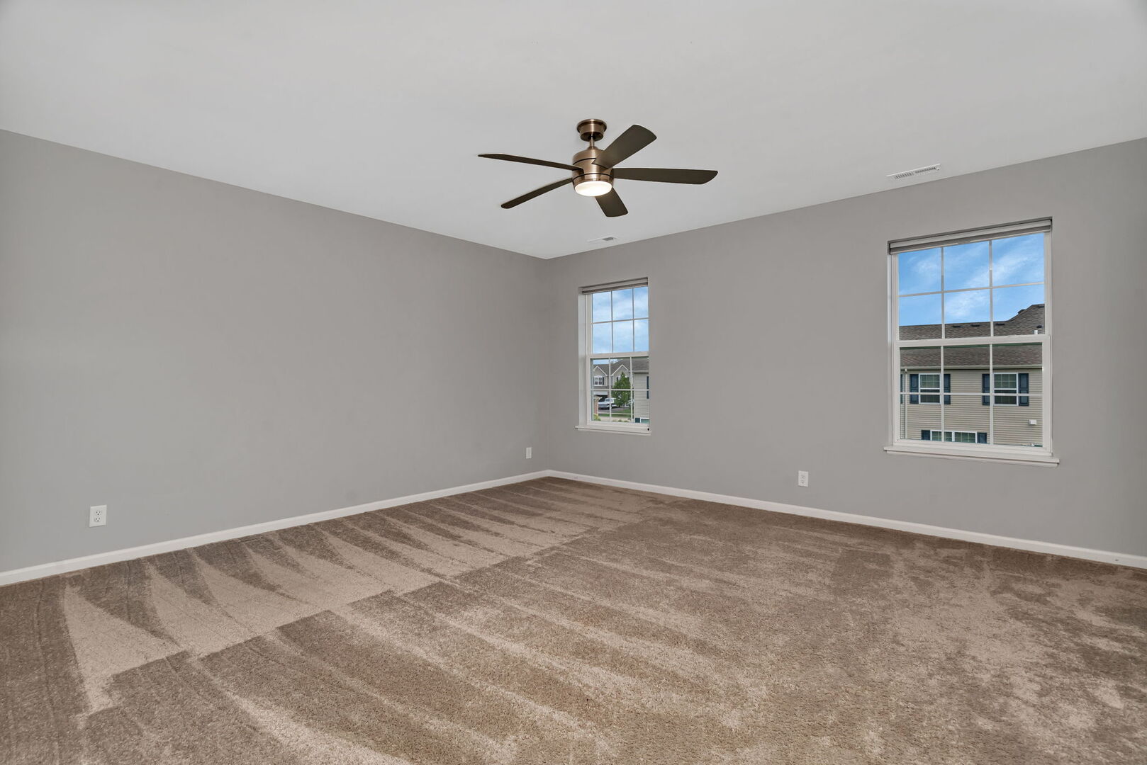 1334 Hawk Hollow Drive Yorkville, IL 60560 - Photo 14 of 28 a view of empty room with window and ceiling fan